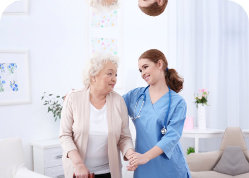 senior woman accompanied by caregiver
