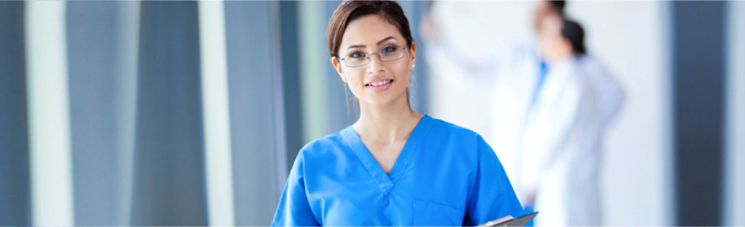 nurse wearing eyeglasses smiling