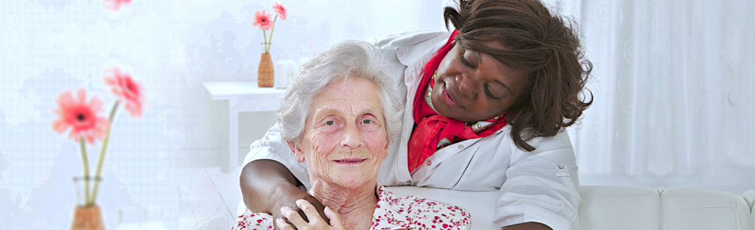 caregiver taking care of senior woman